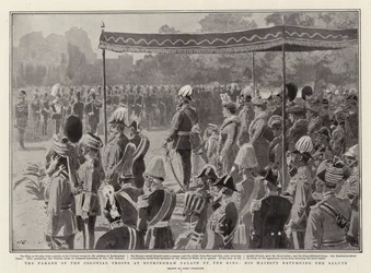 Die Parade der Kolonialtruppen am Buckingham Palace durch den König, Seine Majestät erwidert den Gruß